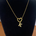 Collar con Inicial de Corazón en Acero Inoxidable