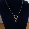 Collar con Inicial de Corazón en Acero Inoxidable